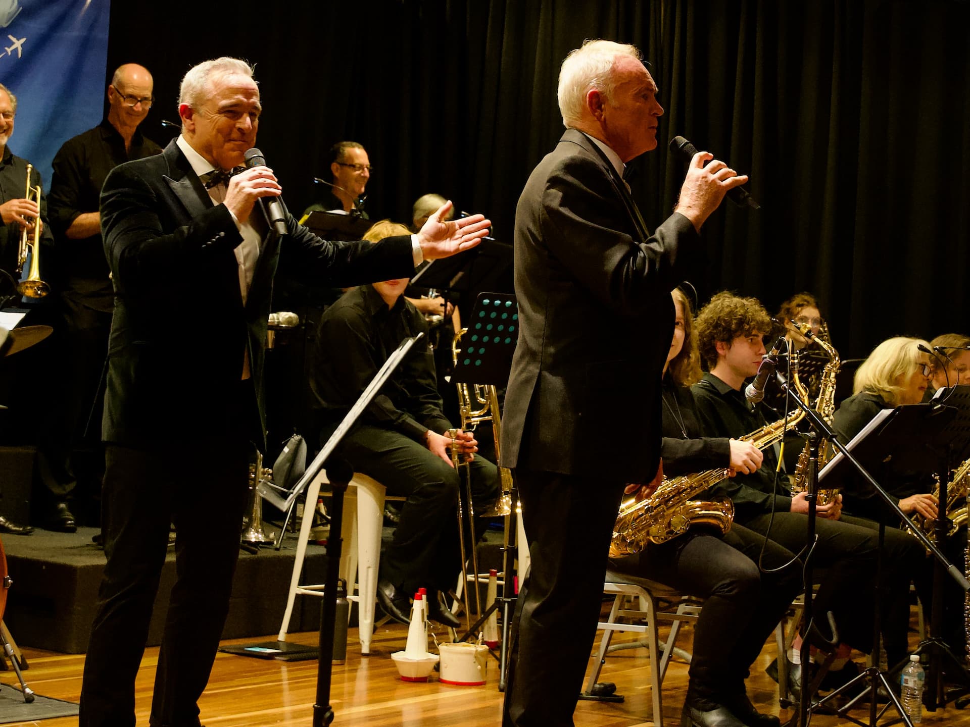 Jazz big band with singers on stage