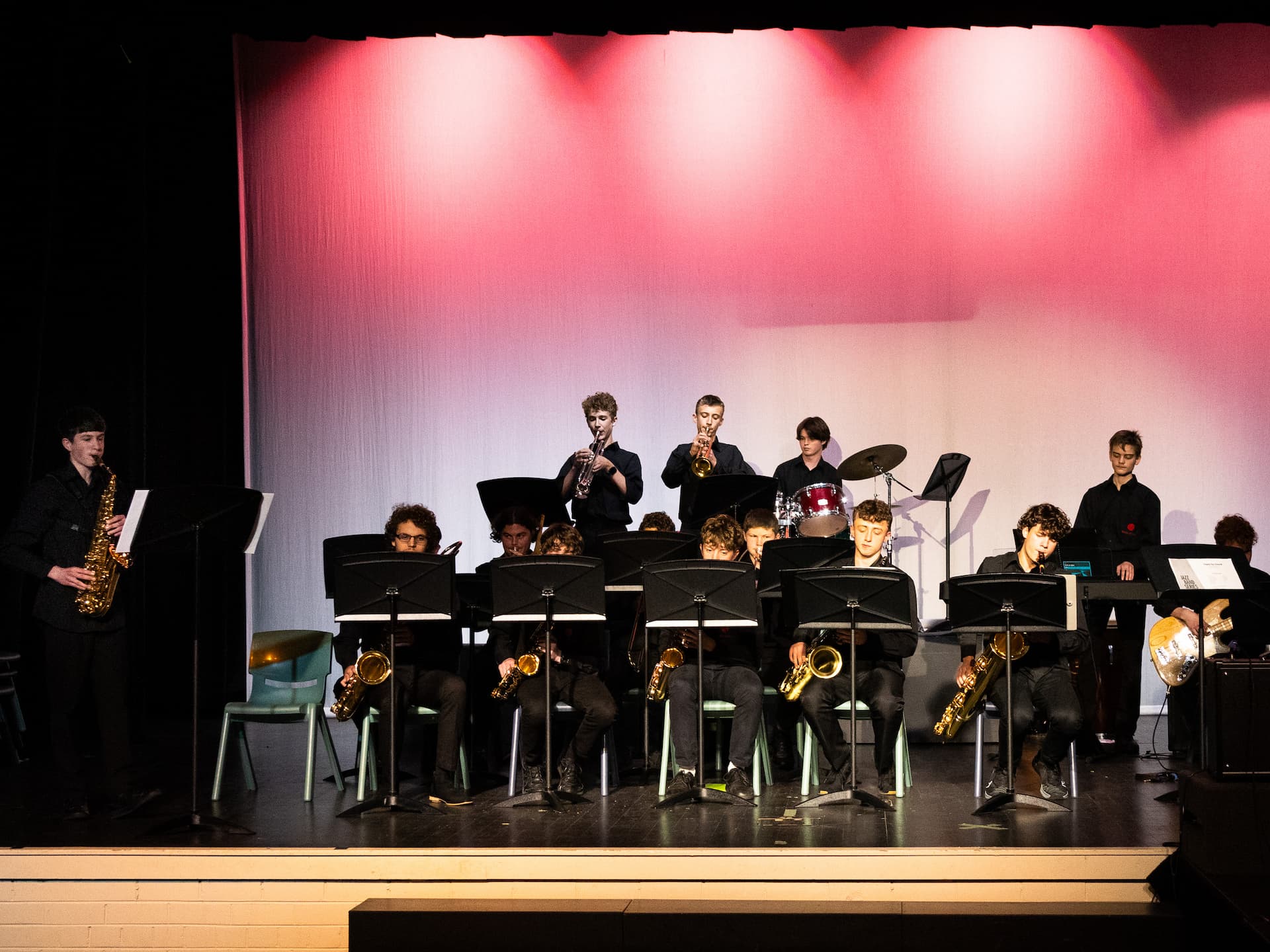 school jazz band performing on stage