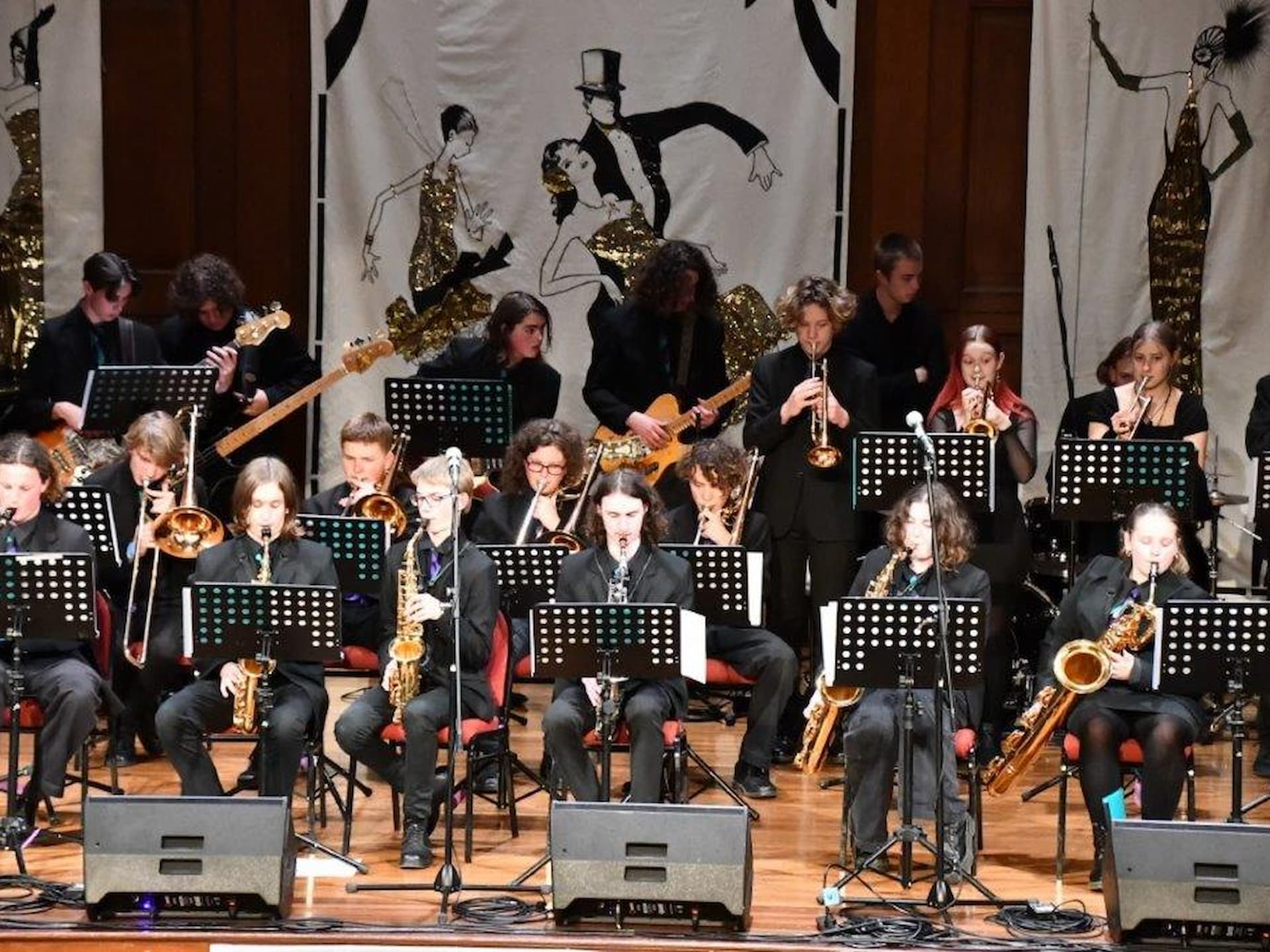 school jazz band performing on stage