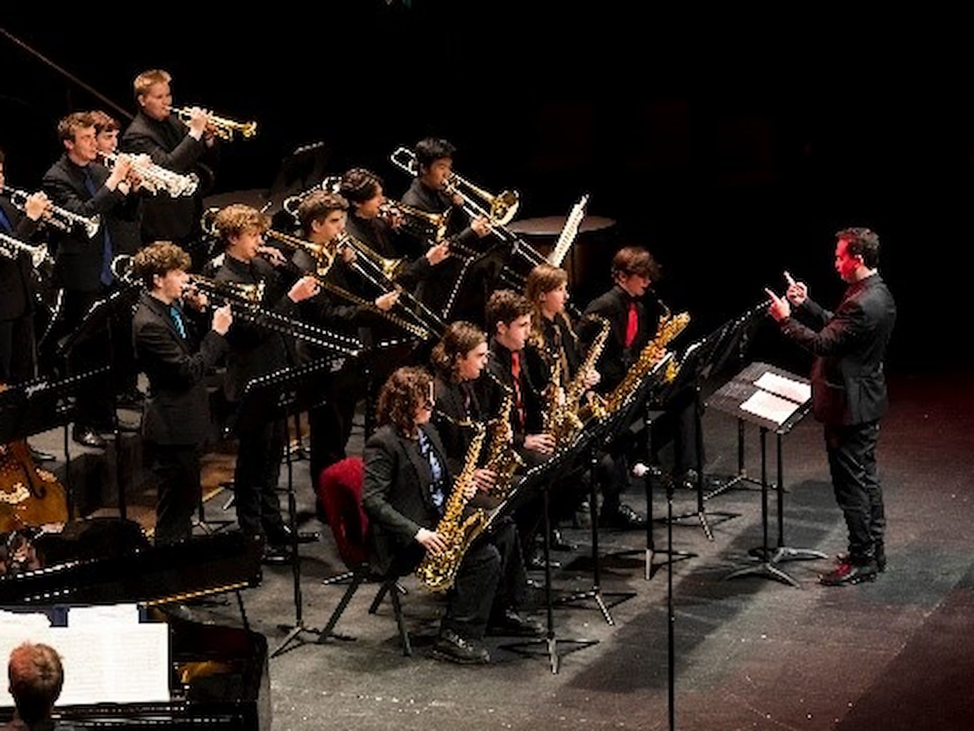 school jazz band performing on stage