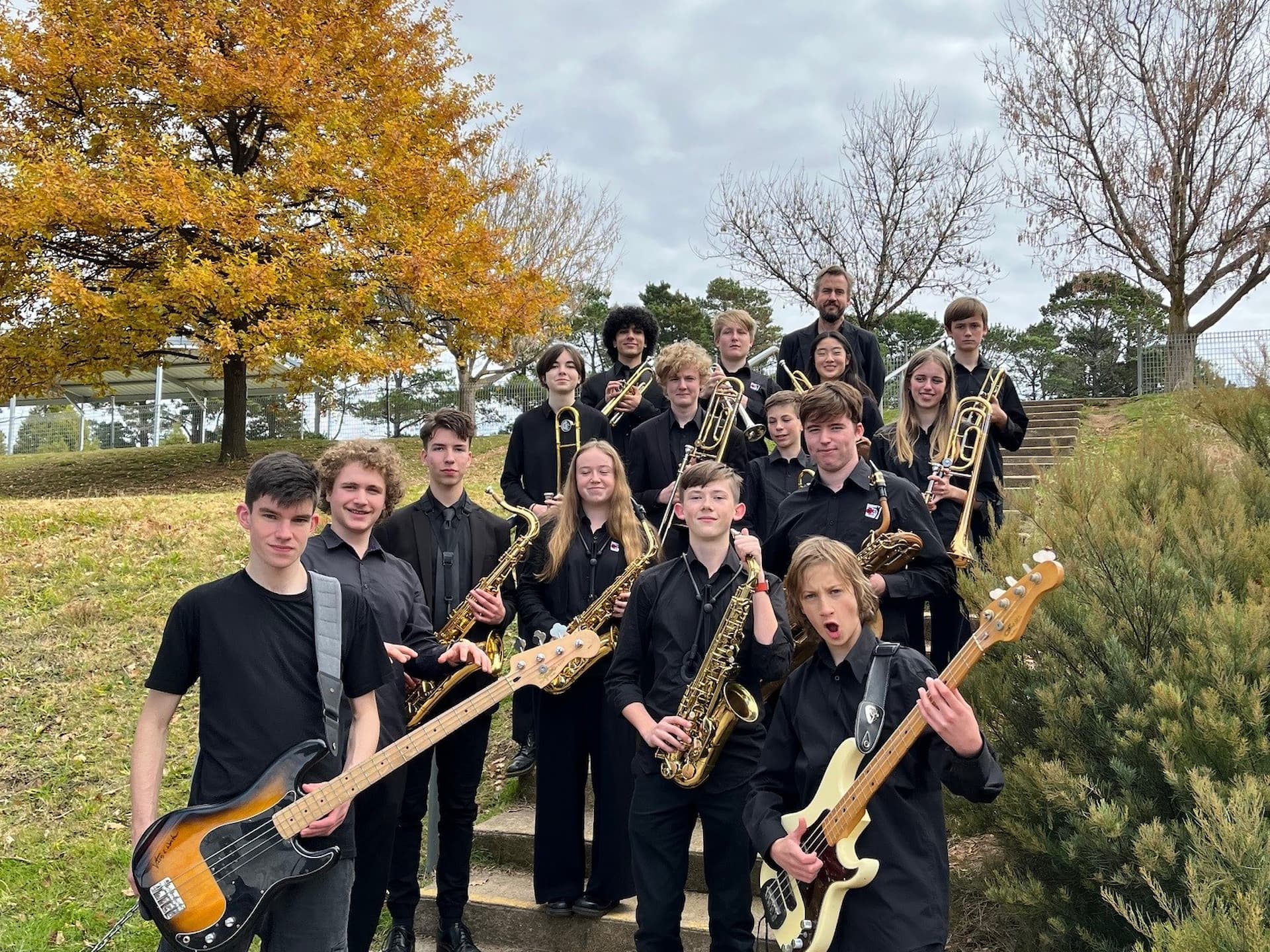 school band holding instruments