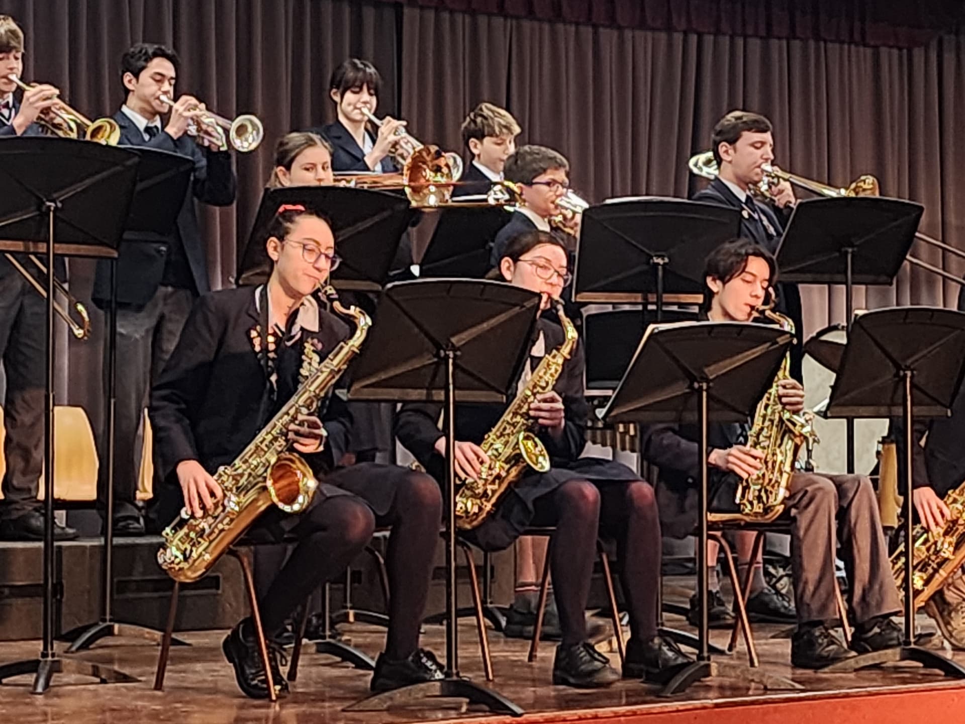 school jazz band performing on stage