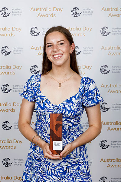 Saskia Rundle Trowbridge holding her award