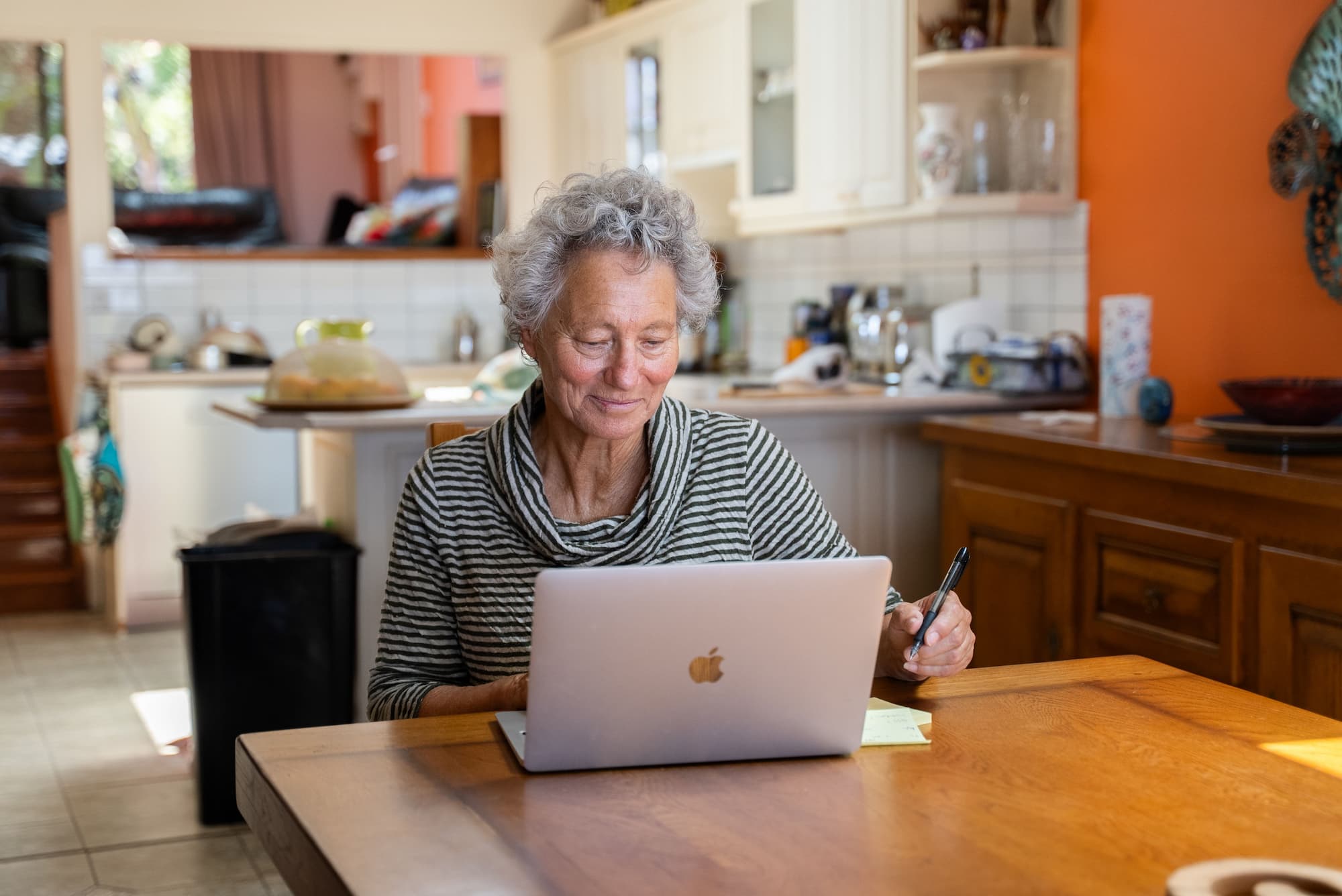 Person in front of the laptop at home