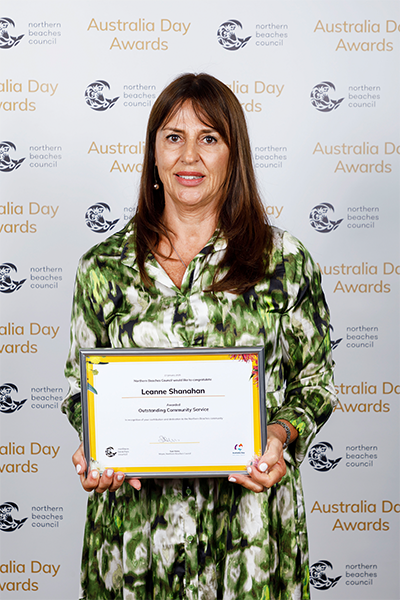 Leanne Shanahan holding her certificate