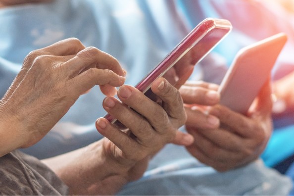 Hands holding a smart phone