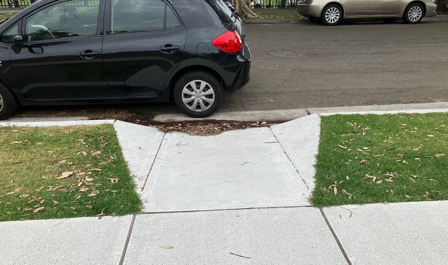 Car parked across drive-way / ramp