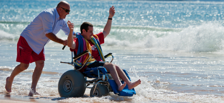 wheelchair-and-carer-at-beach.jpg