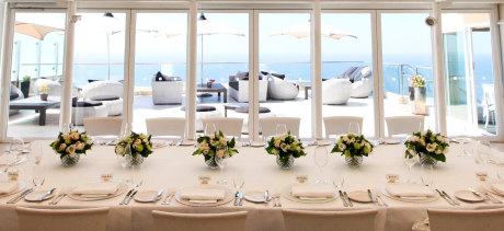 The dining room of a white tablecloth restaurant