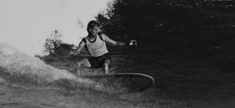 black and white photo of Midgett Farrelly surfing