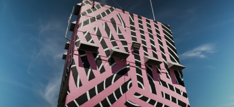 Pink and black three-storey mural