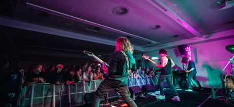 Two musicians playing on stage