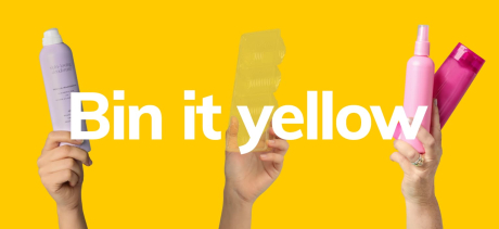 Hands holding yellow bin items
