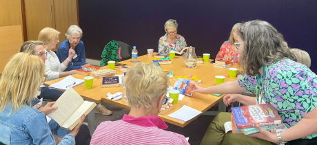 A group of people in a book club