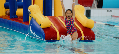 Children playing on inflatable