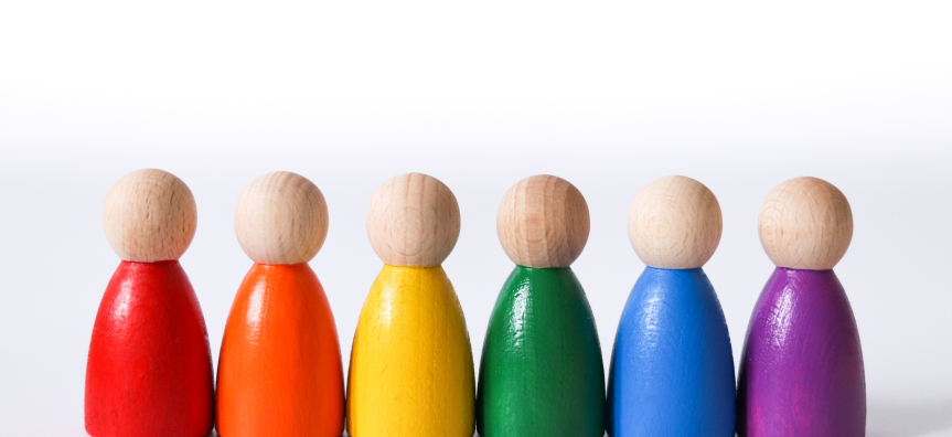six painted wooden peg dolls