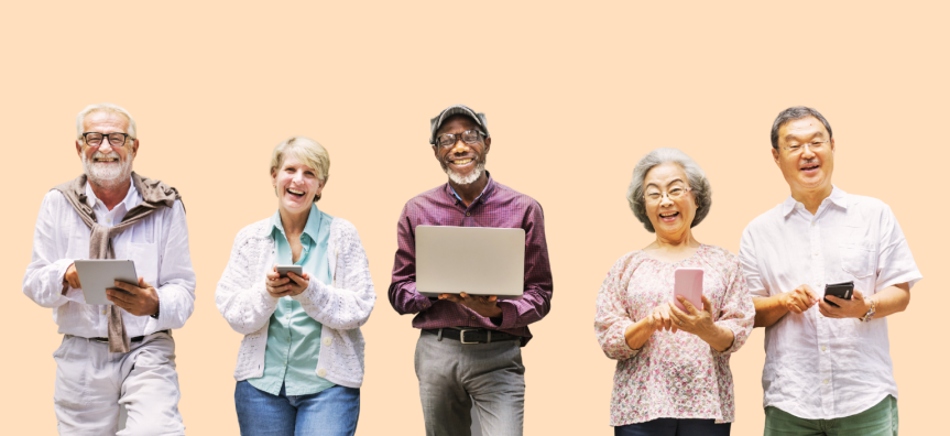 Group of individuals with devices smiling