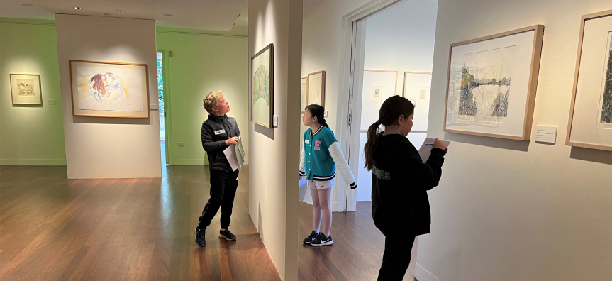 Students viewing artworks