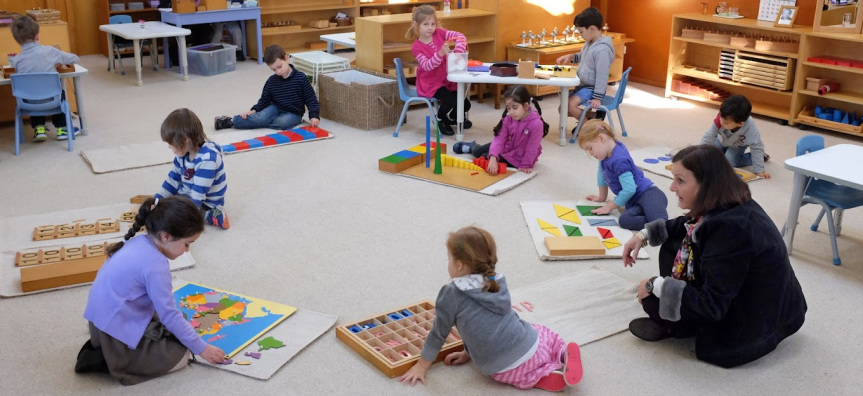 Children and teacher playing