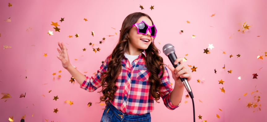 Girl singing into microphone