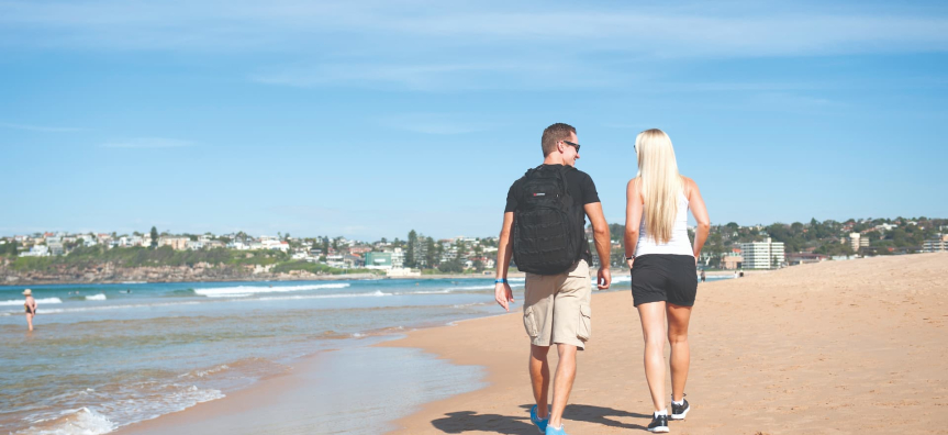 Couple walking on a beach