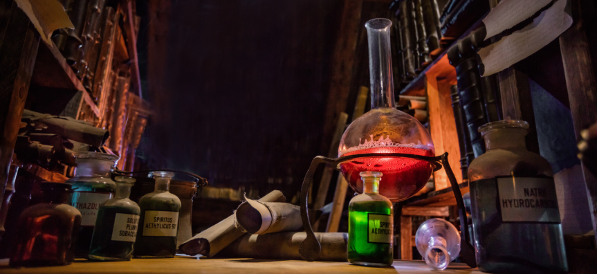 Glass science tubes filled with liquid in a dark room