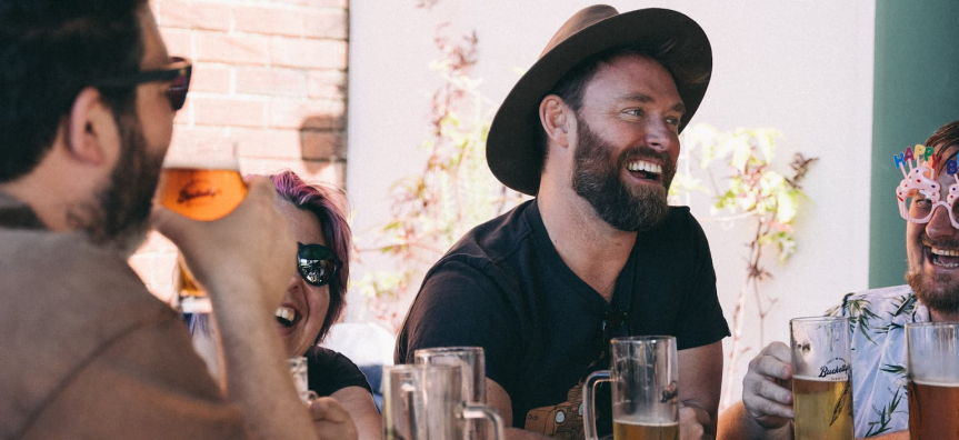 group of people with beers