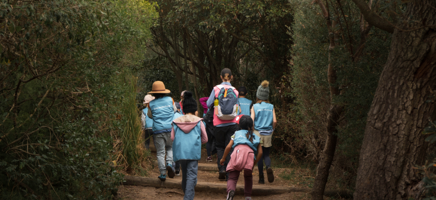 leader and children on a bushwalk