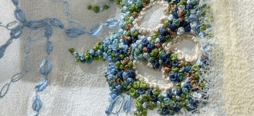 close up of detailed embroidery which emulates the encrustations of the rockpools