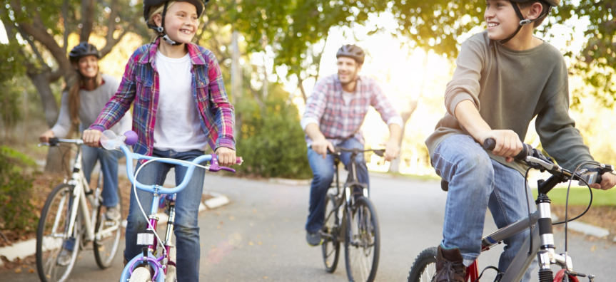 Family riding bikes