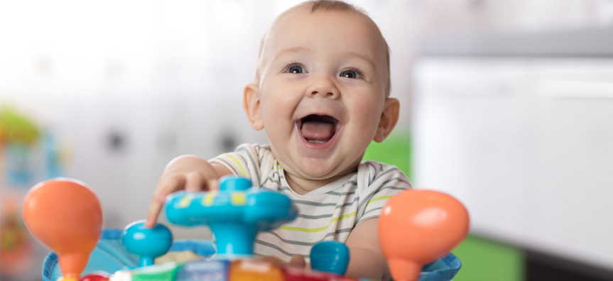 A baby playing with toys