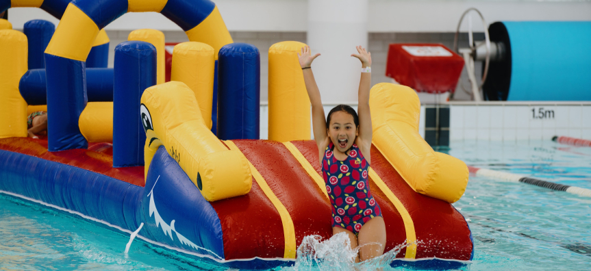 Children playing on inflatable