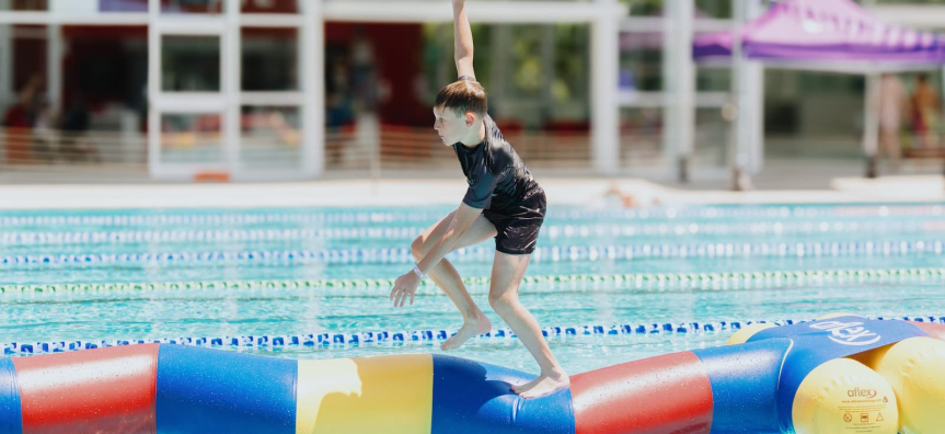 Children playing on inflatables