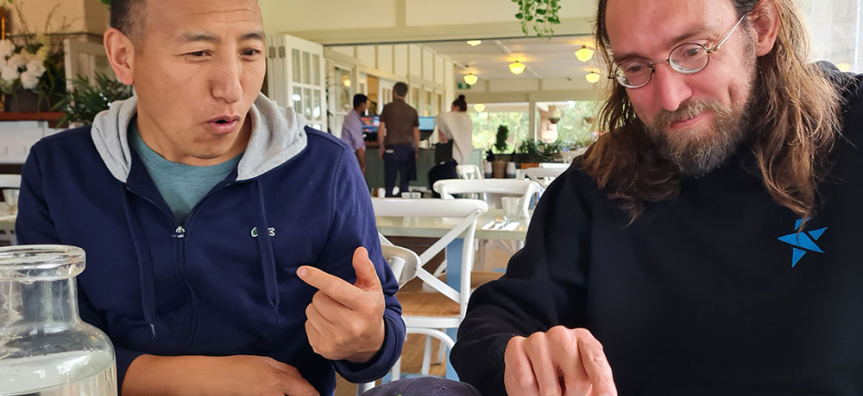 Two people learning in a cafe