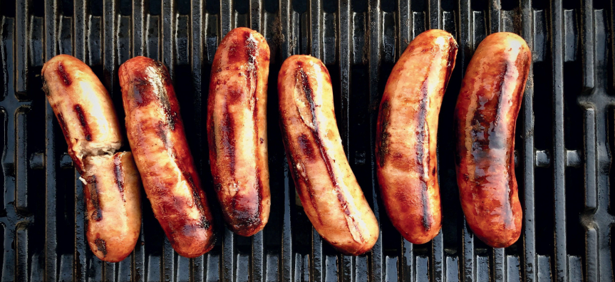 Sausages on a grill