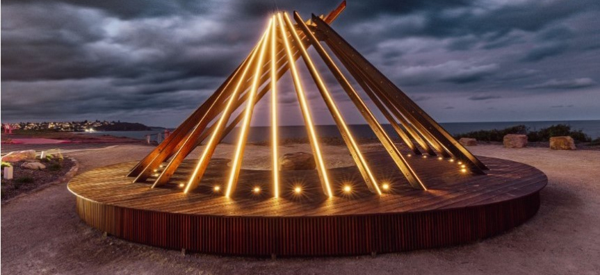 timber artwork on headland