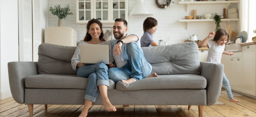 parents watching webinar on computer