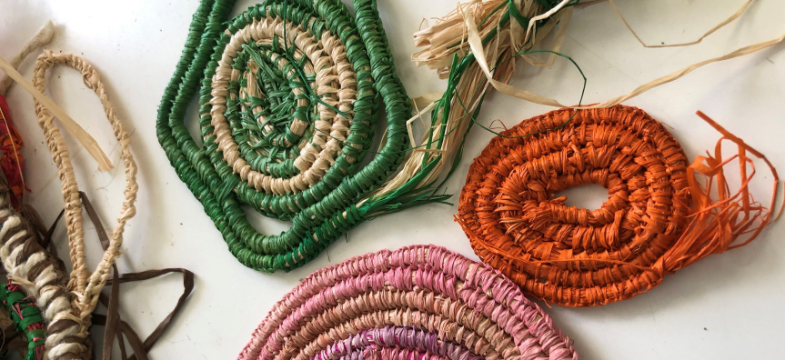 Multi coloured raffia weaved circles