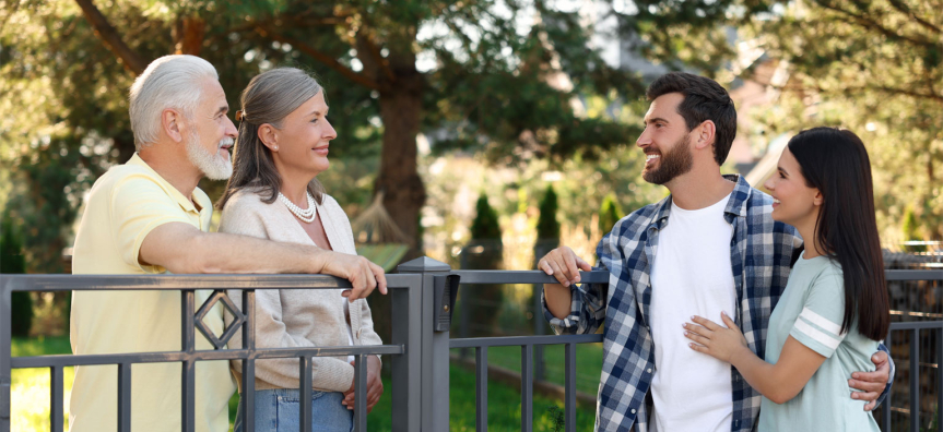 Neighbours chatting over the fence