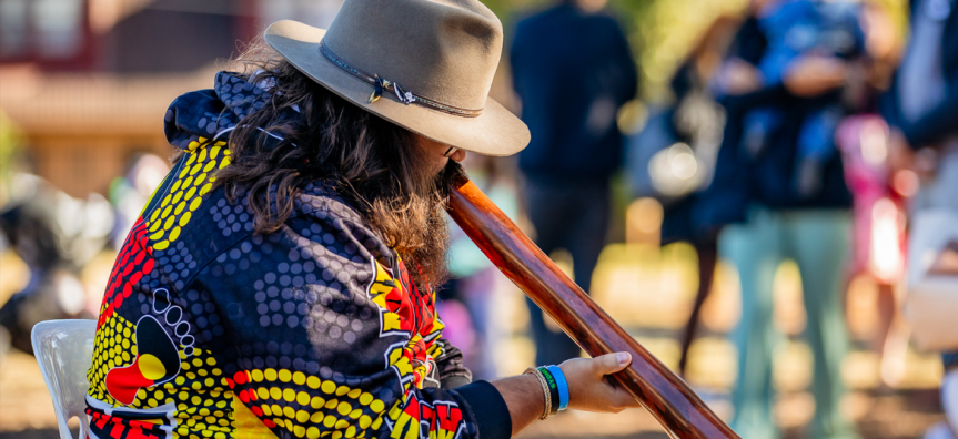Person playing Didgeridoo