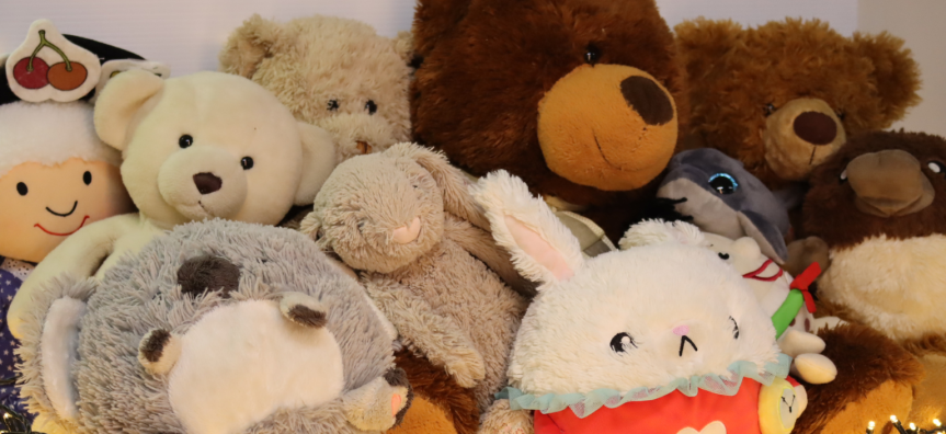 A bunch of teddy bears and soft plush animals