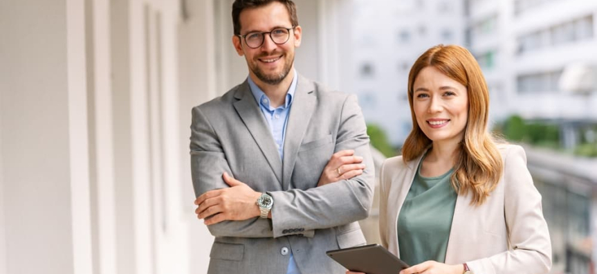 Two Strata people on the balcony