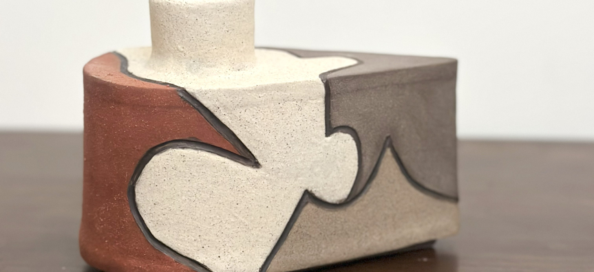 Ceramic vessel with clay slip design
