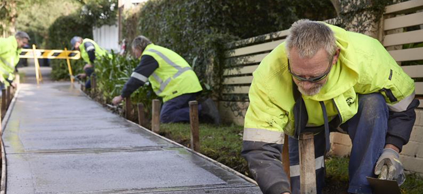 Council workers undergoing footpath works