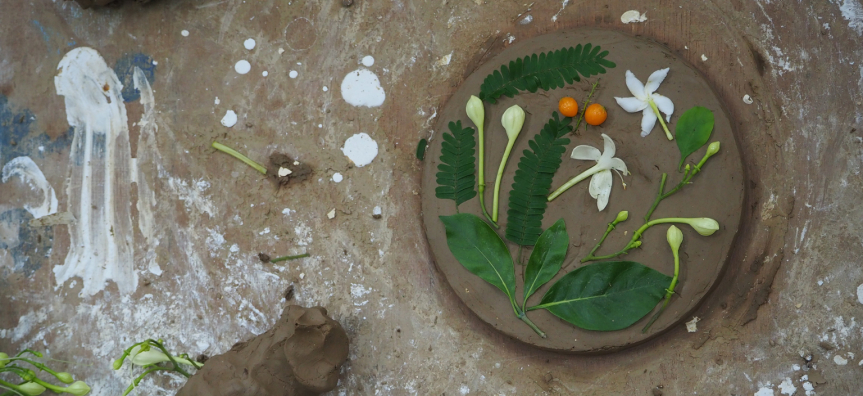 Clay and plants ornament