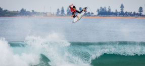 Surfer at narrabeen getting air