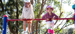 kids on a playground climber