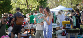 Couple exploring recycle market