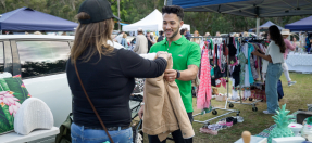 Stallholder and customer at Avalon Car Boot Sale