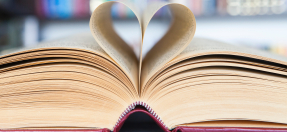 Book with pages folded into a heart 